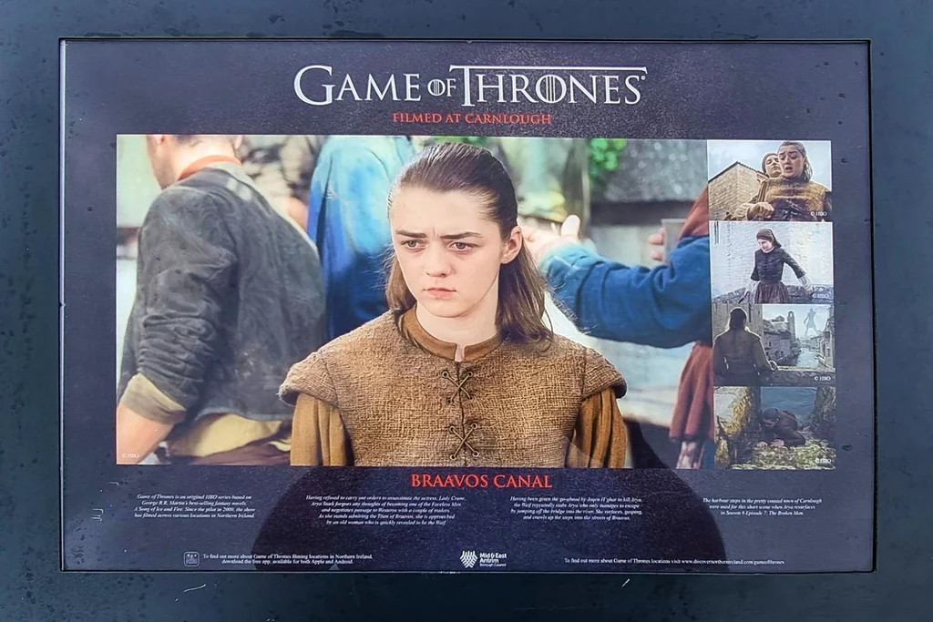Game of Thrones filming location sign at Carnlough Harbour featured on the Game of Thrones Tour