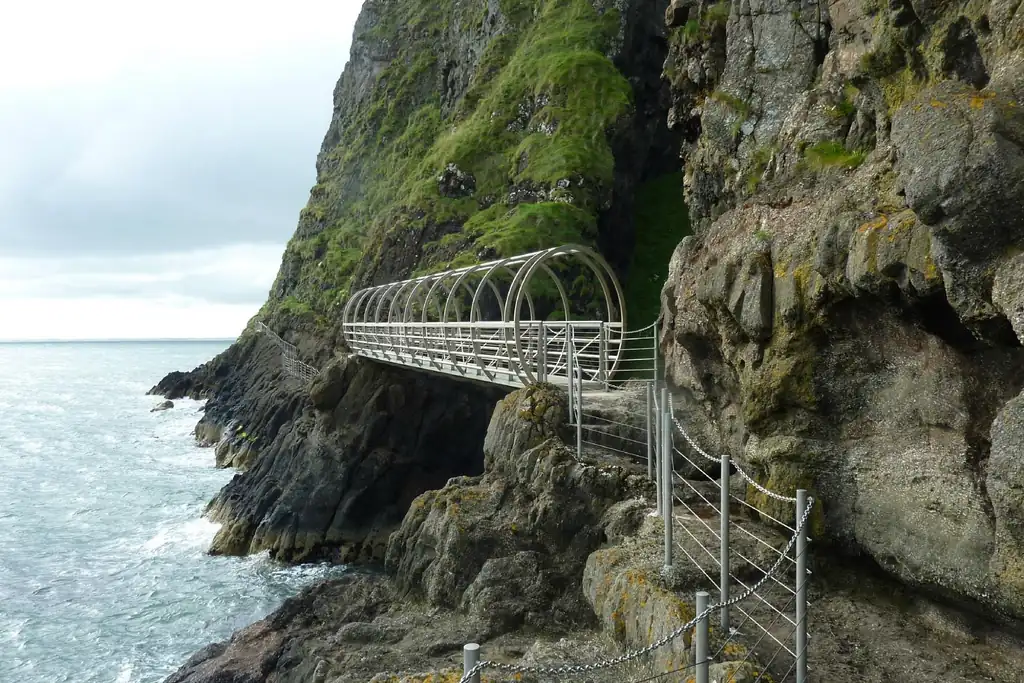 The Gobbins Cliff Path coastal walkway attached to dramatic sea cliffs in Northern Ireland