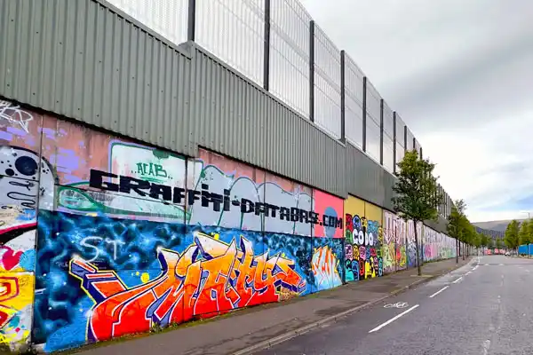 Peace Wall murals on the Falls Road, a stop on our private Belfast city tour