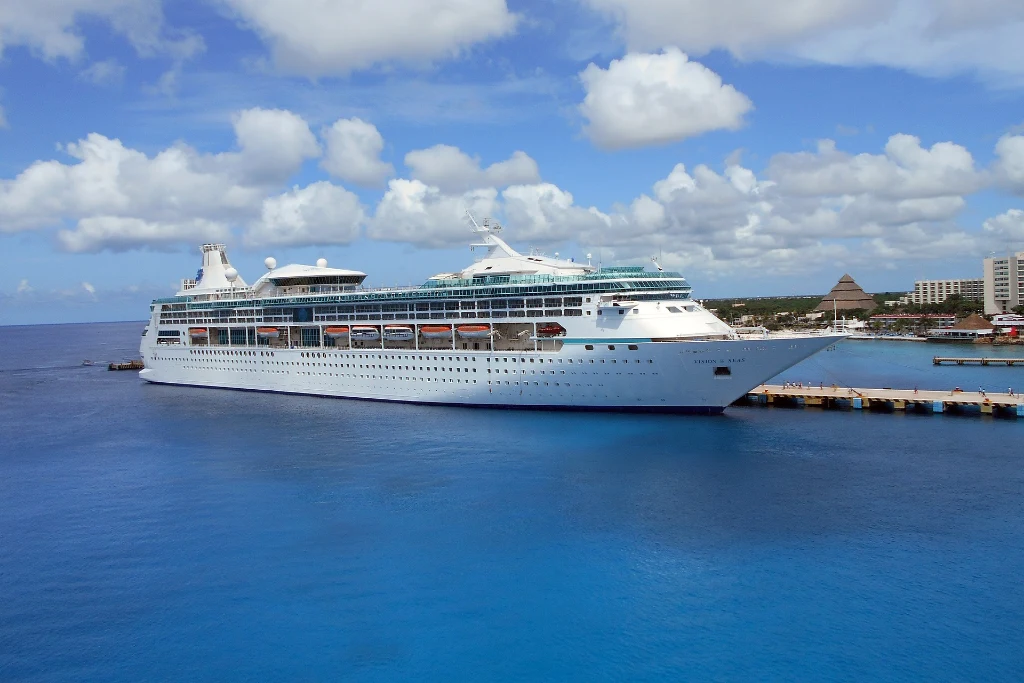 Cruise ship docked at a pier, one of the ways to travel to Northern Ireland by sea